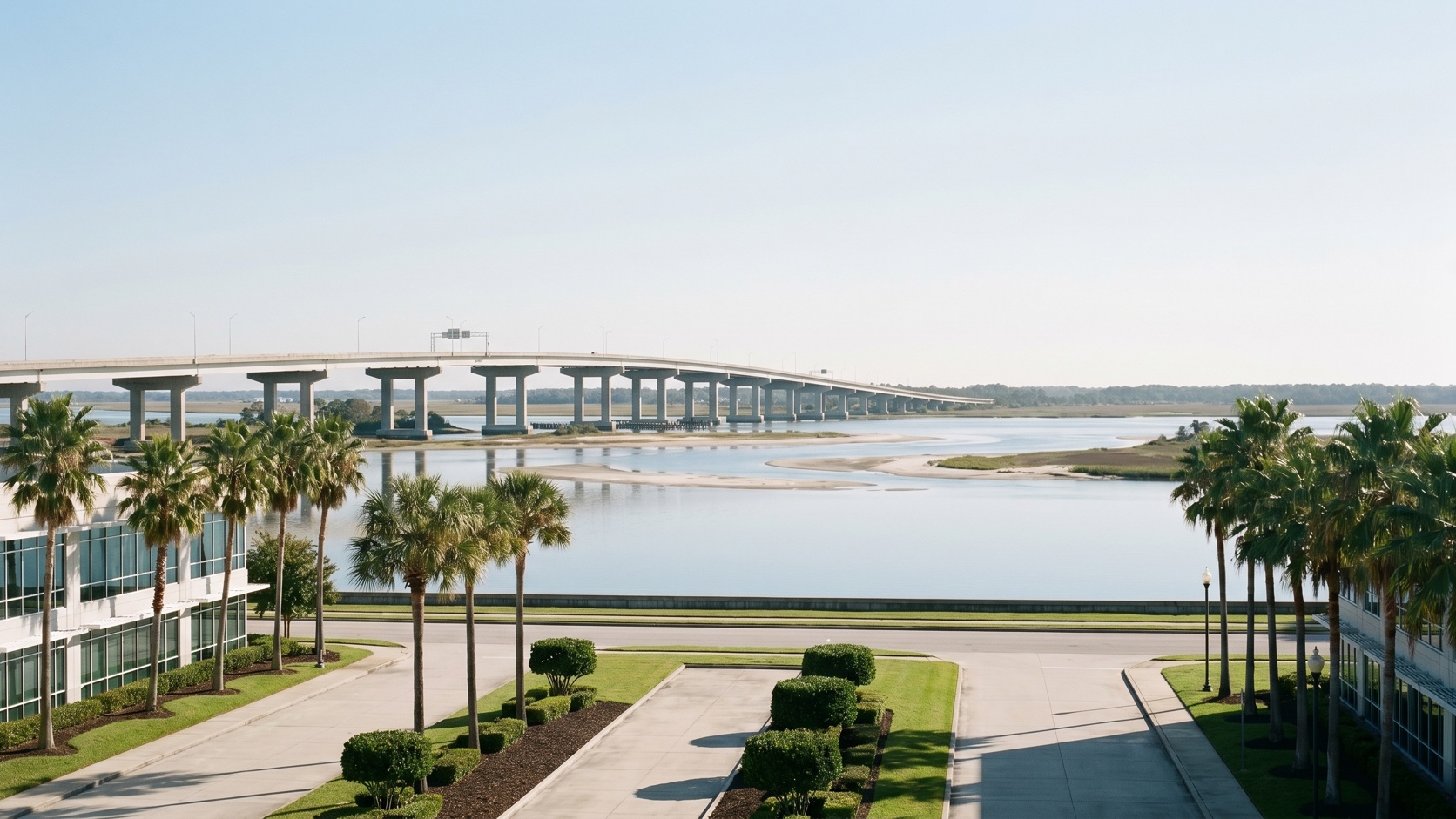 Elevated view of the Cape Coral Bridge crossing the Caloosahatchee River on a bright Southwest Florida morning